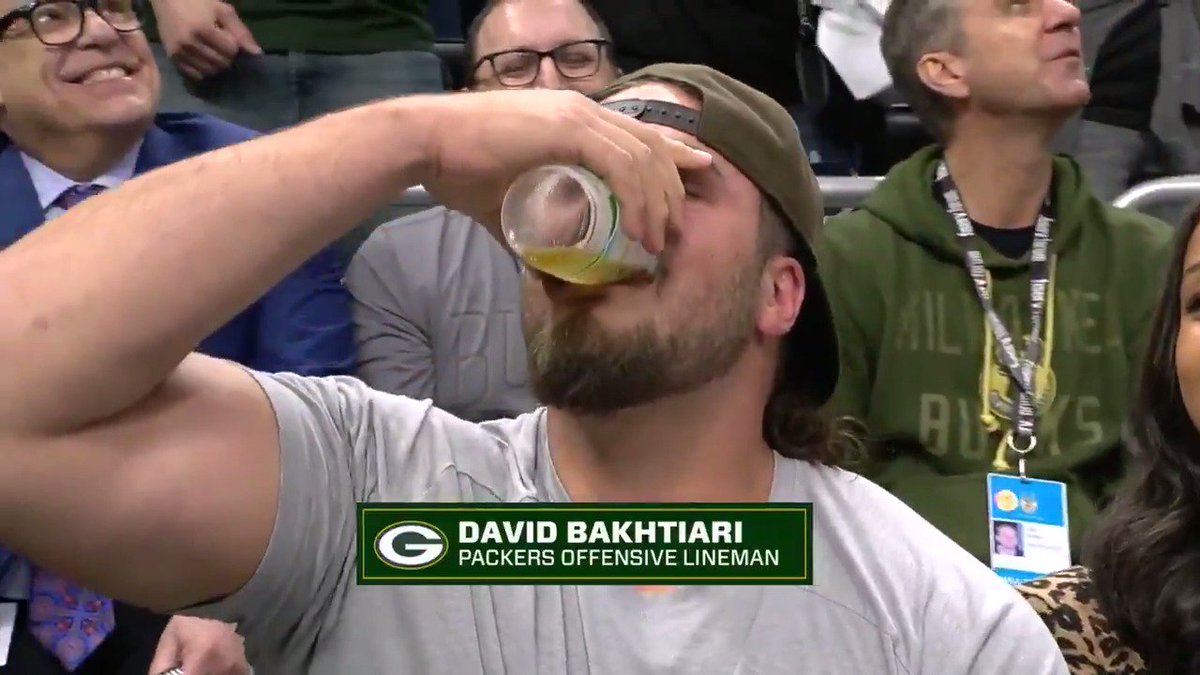 Green Bay packers have beer chug off @ Bucks playoff game 